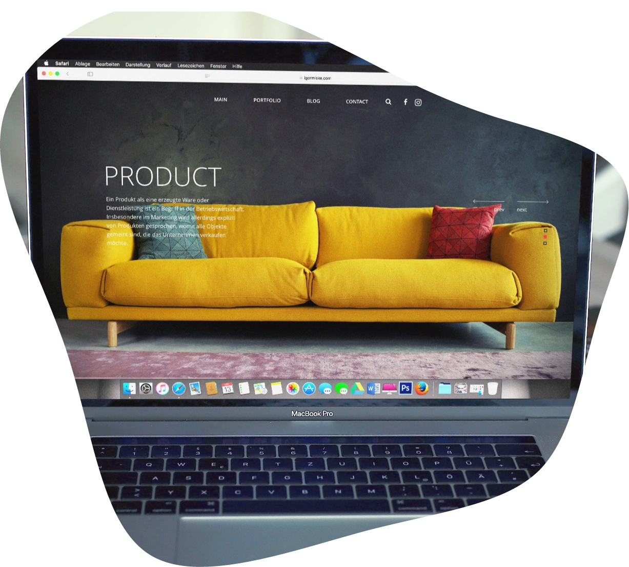 blobbed shaped image with a laptop showing a website with a bright yellow couch for sale